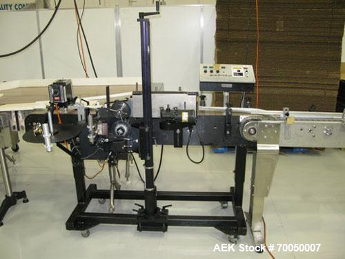 Used Auto Labe Model 966 Pressure Sensitive Wrap Labeler. Machine has a model 310 Hot Stamp imprinter for dates, codes, prices, ingredients, lot numbers or other variables. Can perform at up to 150 l...