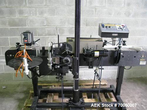Used Auto Labe Model 966 Pressure Sensitive Wrap Labeler. Machine has a model 310 Hot Stamp imprinter for dates, codes, prices, ingredients, lot numbers or other variables. Can perform at up to 150 l...