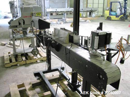 Used Auto Labe Model 966 Pressure Sensitive Wrap Labeler. Machine has a model 310 Hot Stamp imprinter for dates, codes, prices, ingredients, lot numbers or other variables. Can perform at up to 150 l...