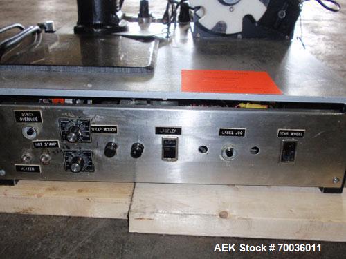 Used Avery 6101 Pressure Sensitive Spot or Wraparound Labeler, Model 6101-3-RH. Bench or tabletop labeler design, has hot stamp date coder, star wheel bottle indexing and 4" label web. Serial #402153...