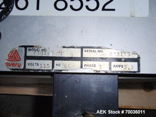 Used Avery 6101 Pressure Sensitive Spot or Wraparound Labeler, Model 6101-3-RH. Bench or tabletop labeler design, has hot stamp date coder, star wheel bottle indexing and 4" label web. Serial #402153...