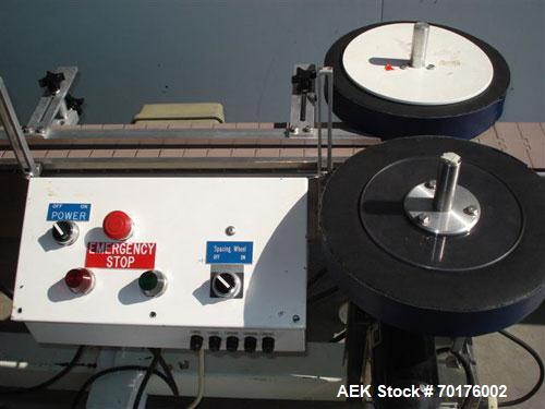 Used CCL Collomat Wrap Around Pressure Sensitive Labeler, model 6600. Can handle a label up to 6.75" high, currently set to run 3.25" high labels. 136.5" long x 4.5" wide conveyor, table top chain be...