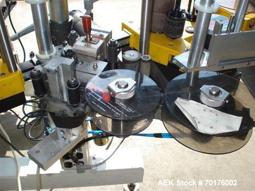 Used CCL Collomat Wrap Around Pressure Sensitive Labeler, model 6600. Can handle a label up to 6.75" high, currently set to run 3.25" high labels. 136.5" long x 4.5" wide conveyor, table top chain be...