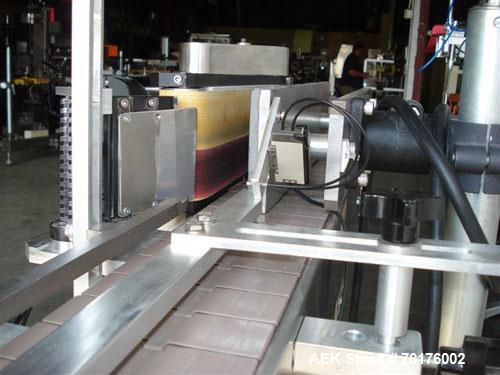 Used CCL Collomat Wrap Around Pressure Sensitive Labeler, model 6600. Can handle a label up to 6.75" high, currently set to run 3.25" high labels. 136.5" long x 4.5" wide conveyor, table top chain be...