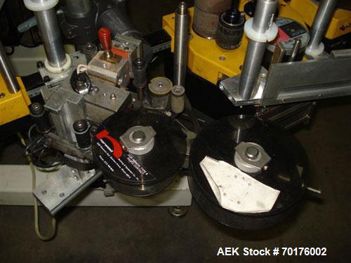 Used CCL Collomat Wrap Around Pressure Sensitive Labeler, model 6600. Can handle a label up to 6.75" high, currently set to run 3.25" high labels. 136.5" long x 4.5" wide conveyor, table top chain be...