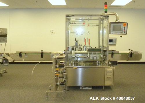 Used Libra Pharmaceutical Technologies Pressure Sensitive Bottle Labeler, Model SENS 350. Designed to apply pressure sensitive labels on cylindrical containers of metal, glass, or plastic. Maximum ou...