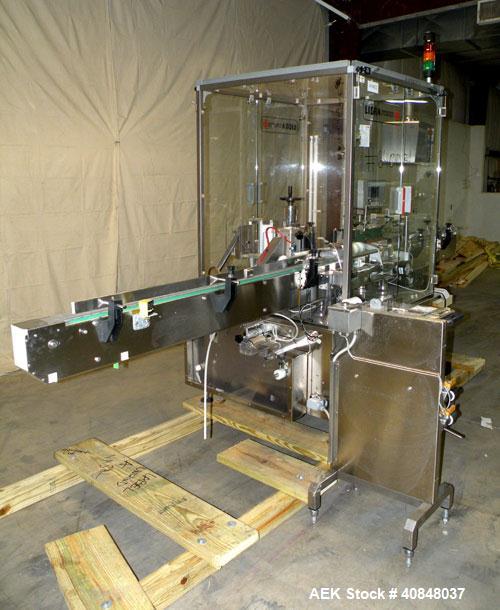 Used Libra Pharmaceutical Technologies Pressure Sensitive Bottle Labeler, Model SENS 350. Designed to apply pressure sensitive labels on cylindrical containers of metal, glass, or plastic. Maximum ou...