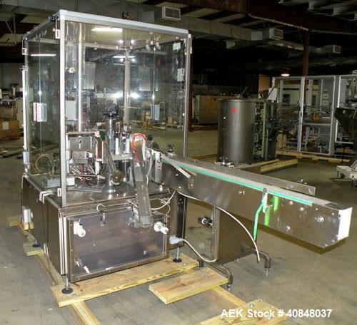 Used Libra Pharmaceutical Technologies Pressure Sensitive Bottle Labeler, Model SENS 350. Designed to apply pressure sensitive labels on cylindrical containers of metal, glass, or plastic. Maximum ou...