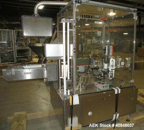 Used Libra Pharmaceutical Technologies Pressure Sensitive Bottle Labeler, Model SENS 350. Designed to apply pressure sensitive labels on cylindrical containers of metal, glass, or plastic. Maximum ou...