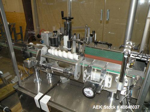Used Libra Pharmaceutical Technologies Pressure Sensitive Bottle Labeler, Model SENS 350. Designed to apply pressure sensitive labels on cylindrical containers of metal, glass, or plastic. Maximum ou...