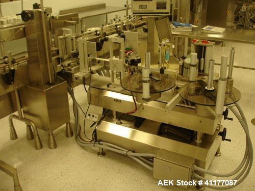 Used Kalish Labelstar Wraparound Pressure Sensitve Labeler, Model LS4000. Capable of speeds up to 150 cpm. Unit has Acuity PMC80 vision system, open date hot stamp coder bump wheel indexing, top hold...