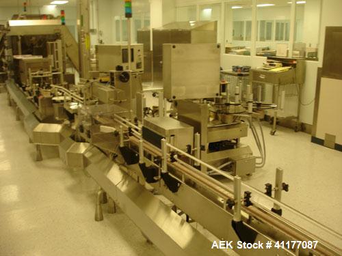 Used Kalish Labelstar Wraparound Pressure Sensitve Labeler, Model LS4000. Capable of speeds up to 150 cpm. Unit has Acuity PMC80 vision system, open date hot stamp coder bump wheel indexing, top hold...