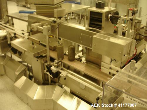 Used Kalish Labelstar Wraparound Pressure Sensitve Labeler, Model LS4000. Capable of speeds up to 150 cpm. Unit has Acuity PMC80 vision system, open date hot stamp coder bump wheel indexing, top hold...
