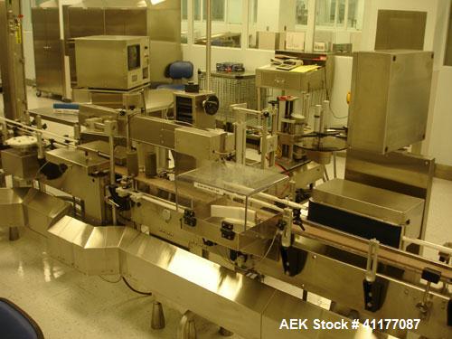 Used Kalish Labelstar Wraparound Pressure Sensitve Labeler, Model LS4000. Capable of speeds up to 150 cpm. Unit has Acuity PMC80 vision system, open date hot stamp coder bump wheel indexing, top hold...