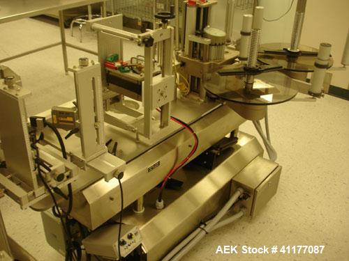 Used Kalish Labelstar Wraparound Pressure Sensitve Labeler, Model LS4000. Capable of speeds up to 150 cpm. Unit has Acuity PMC80 vision system, open date hot stamp coder bump wheel indexing, top hold...