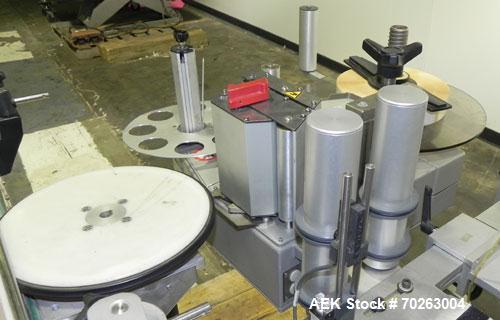 Used Kalish Labelstar wraparound labeler with labeling head.