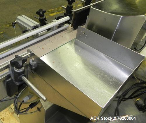 Used Kalish Labelstar wraparound labeler with labeling head.