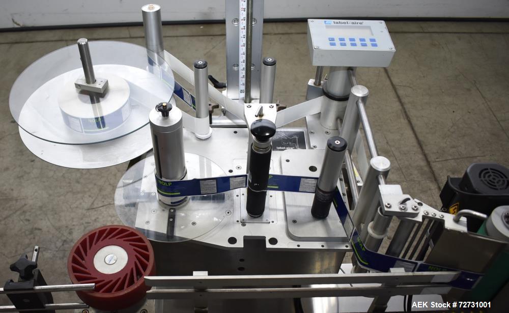Used Label-Aire 5100 Automatic Wraparound Pressure Sensitive Labeler, Model 5100 6.0" X 8FT 3115. Capable of dispensing up to 1200" per minute. Web width .63" to 7.13". Has a 7"H x 12"L wrap belt. 7"...