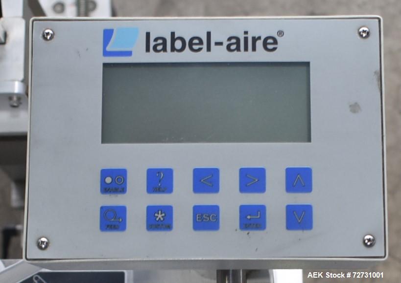 Used Label-Aire 5100 Automatic Wraparound Pressure Sensitive Labeler, Model 5100 6.0" X 8FT 3115. Capable of dispensing up to 1200" per minute. Web width .63" to 7.13". Has a 7"H x 12"L wrap belt. 7"...