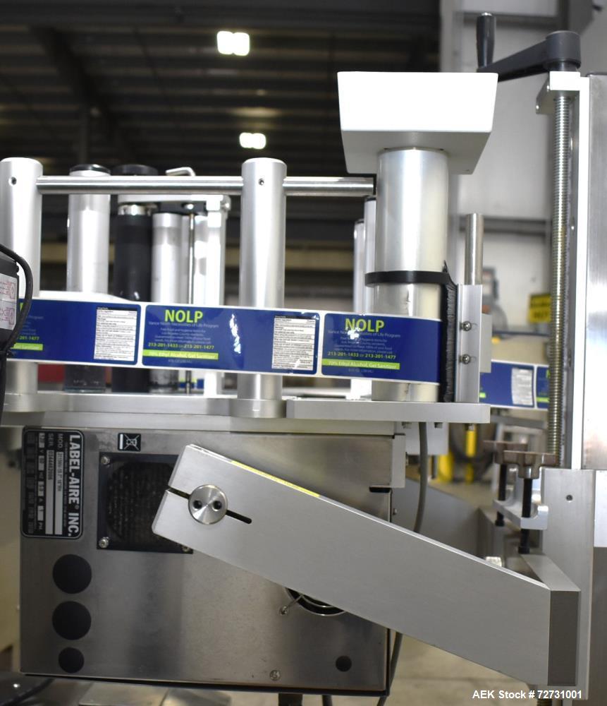 Used Label-Aire 5100 Automatic Wraparound Pressure Sensitive Labeler, Model 5100 6.0" X 8FT 3115. Capable of dispensing up to 1200" per minute. Web width .63" to 7.13". Has a 7"H x 12"L wrap belt. 7"...
