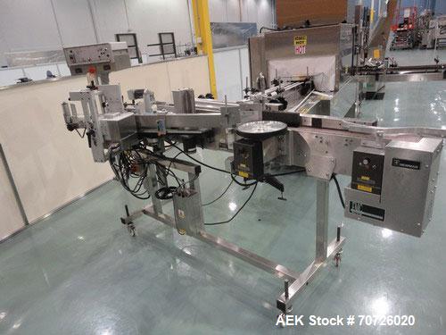 Used Newman NV2 (NVII) Automatic Pressure Sensitive Labeler. Capable of speeds up to 150 containers per minute. Has a label size range: 10mm to 150mm. Model NV11, Serial #95234. Features single head ...