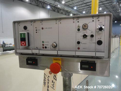 Used Newman NV2 (NVII) Automatic Pressure Sensitive Labeler. Capable of speeds up to 150 containers per minute. Has a label size range: 10mm to 150mm. Model NV11, Serial #95234. Features single head ...