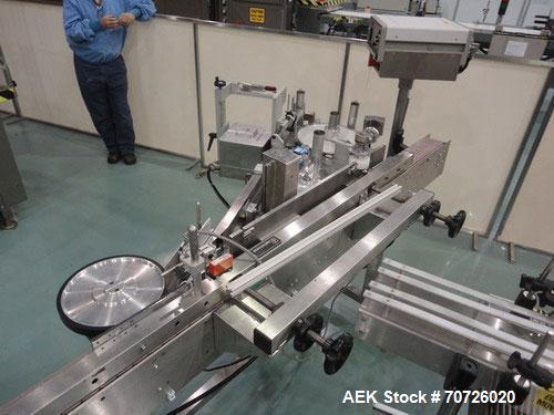 Used Newman NV2 (NVII) Automatic Pressure Sensitive Labeler. Capable of speeds up to 150 containers per minute. Has a label size range: 10mm to 150mm. Model NV11, Serial #95234. Features single head ...