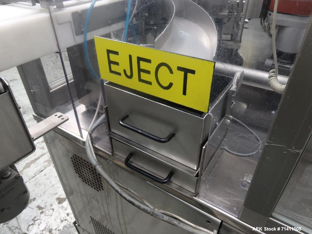 Used Neri Pressure Sensitive Trunion Wraparound Vial/Ampoule Labeler