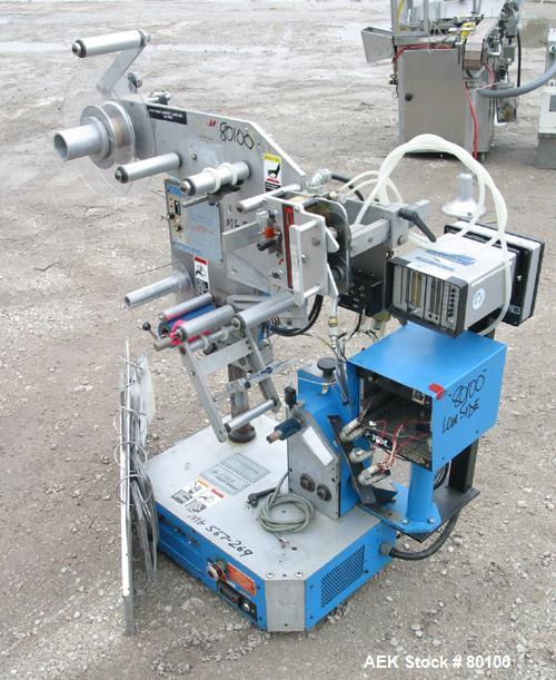 Used New Jersey Machine Co Colt "Easy Wrap" model 325-123 and 305L-459 table top semi-automatic labeler machine.