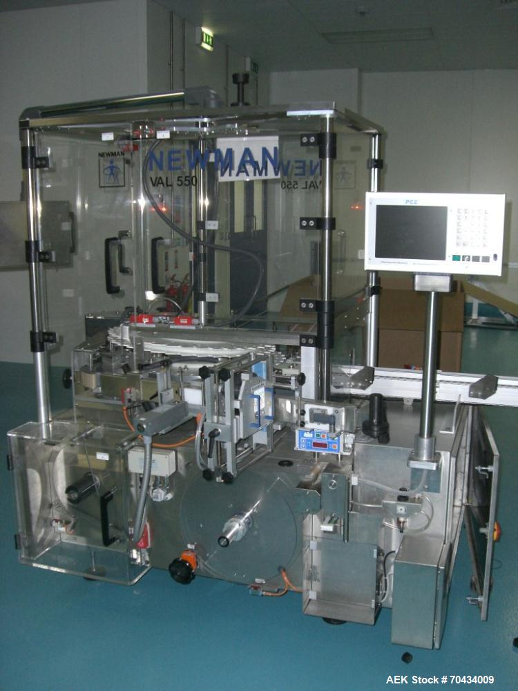 Used Newman Model VAL550 Labeller. Approximate maximum output 600 cpm. Includes PCE control system and in / out conveyors. Container size range: (Diameter) 8mm - 50mm. Label size range: (Height) 12mm...