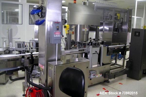 Used Weiler Model PRL1500-S10 (10) Station Pressure Sensitive Rotary Labeler. With outsert placer and rack feeder, rated up to 375 BPM, 6" high label unwind, includes change parts for 60 ml and 325 m...