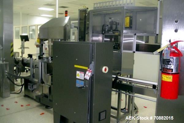 Used Weiler Model PRL1500-S10 (10) Station Pressure Sensitive Rotary Labeler. With outsert placer and rack feeder, rated up to 375 BPM, 6" high label unwind, includes change parts for 60 ml and 325 m...