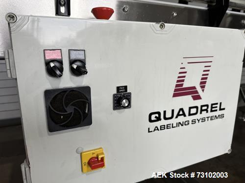 Quadrel Model Econoline 4 Panel Wrap Pressure Sensitive wrap labeler.