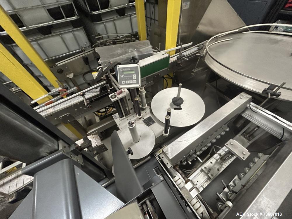 Used Quadrel Labeling Systems Labeler. Model Moduline 3 Wraparound Pressure Sensitive Labeler. Plastic table-top chain conveyor, 120 in. long x 4.5 in. wide x 34 in. tall.