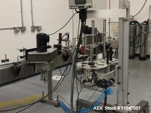 Used Quadrel model Q60 Wraparound Pressure Sensitive Labeler with Norwood Hot Stamp Coder. Has a 7" labeling head serial number M2 v 1.3 MV computer control. Norwood hot stamp date coder. 4.5" x 15' ...