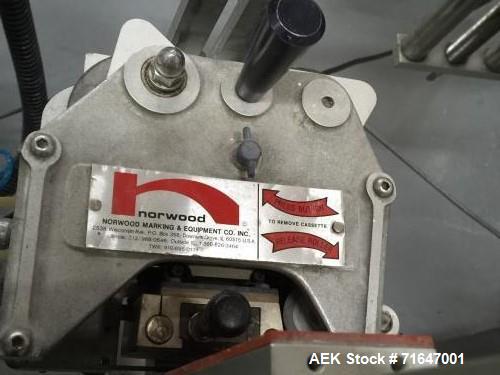 Used Quadrel model Q60 Wraparound Pressure Sensitive Labeler with Norwood Hot Stamp Coder. Has a 7" labeling head serial number M2 v 1.3 MV computer control. Norwood hot stamp date coder. 4.5" x 15' ...