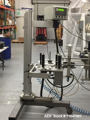 Used Quadrel model Q60 Wraparound Pressure Sensitive Labeler with Norwood Hot Stamp Coder. Has a 7" labeling head serial number M2 v 1.3 MV computer control. Norwood hot stamp date coder. 4.5" x 15' ...