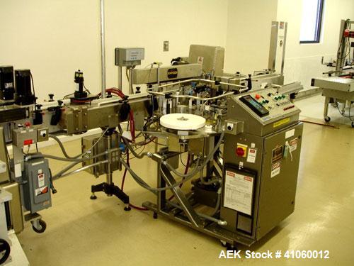 Used Sancoa Outsert Application Machine, Model OP-2000, with single label head, serial #3778.