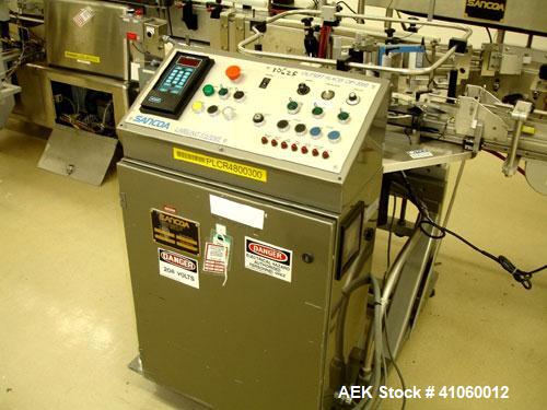 Used Sancoa Outsert Application Machine, Model OP-2000, with single label head, serial #3778.