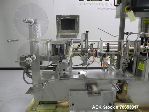 Used Weiler Labeling Systems (Sancoa) Model PRL-2000-S10 Rotary Pressure Sensitive Labeler. 10 Head unit designed to run front and back and wrap applications. Originally ran from 7 ml - 30 ml round b...