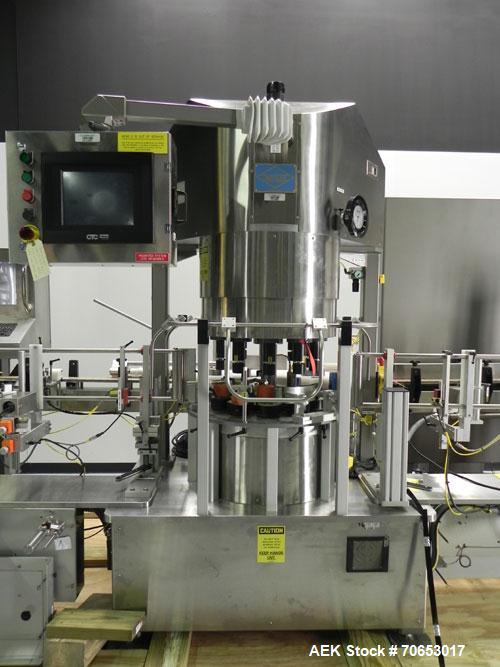 Used Weiler Labeling Systems (Sancoa) Model PRL-2000-S10 Rotary Pressure Sensitive Labeler. 10 Head unit designed to run front and back and wrap applications. Originally ran from 7 ml - 30 ml round b...