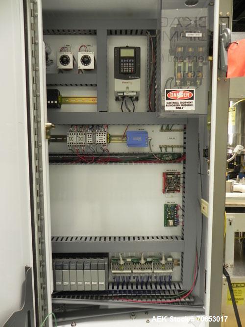 Used Weiler Labeling Systems (Sancoa) Model PRL-2000-S10 Rotary Pressure Sensitive Labeler. 10 Head unit designed to run front and back and wrap applications. Originally ran from 7 ml - 30 ml round b...