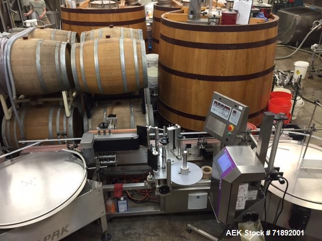 Used Tronics Model S30 Series 3 Pressure Sensitive Wraparound Labeler.