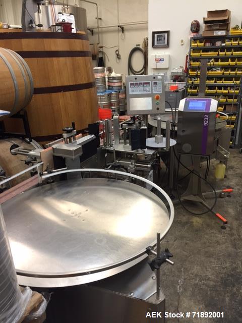 Used Tronics Model S30 Series 3 Pressure Sensitive Wraparound Labeler.