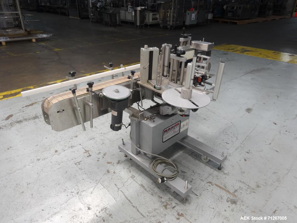 Used Tronics Model TSA  Pressure Sensitive Wraparound Labeler