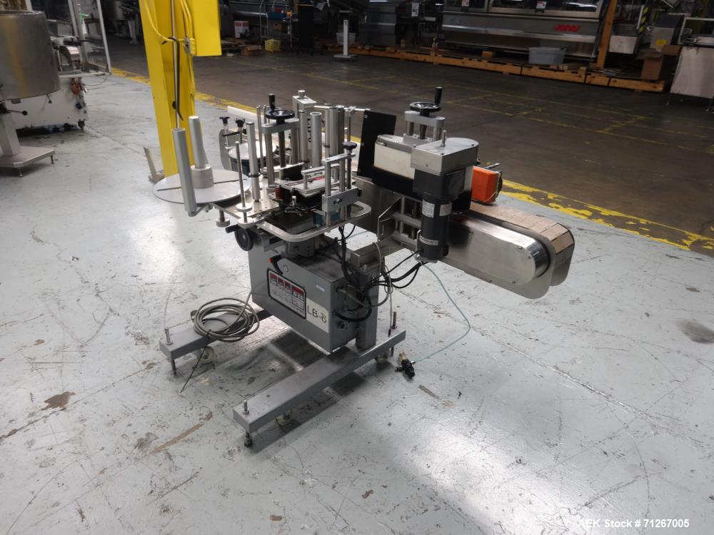 Used Tronics Model TSA  Pressure Sensitive Wraparound Labeler