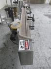 Used New Jersey Wrap Around Labeler, Model UNI300V-S007. Includes Optel vision system, model Optel OP300, 120 volt, serial# 15305-02, built 2004.