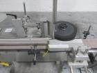 Used New Jersey Wrap Around Labeler, Model UNI300V-S007. Includes Optel vision system, model Optel OP300, 120 volt, serial# 15305-02, built 2004.