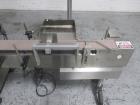 Used New Jersey Wrap Around Labeler, Model UNI300V-S007. Includes Optel vision system, model Optel OP300, 120 volt, serial# 15305-02, built 2004.