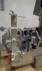 Used Used Sancoa rotary labeler. model# PRL 1500R-S10, 10 station, right hand label head, dual label unwind stand, Industrial Dynamic Lastec laser coder with vision system, onboard side serter head, ...